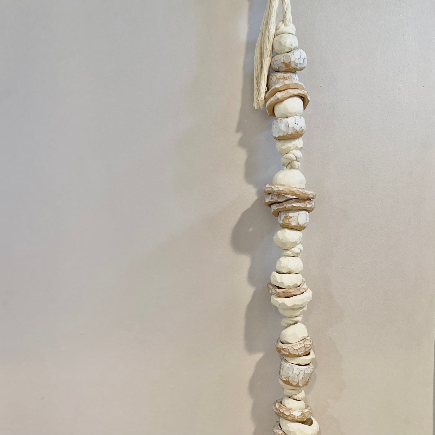 white strung ceramic beads