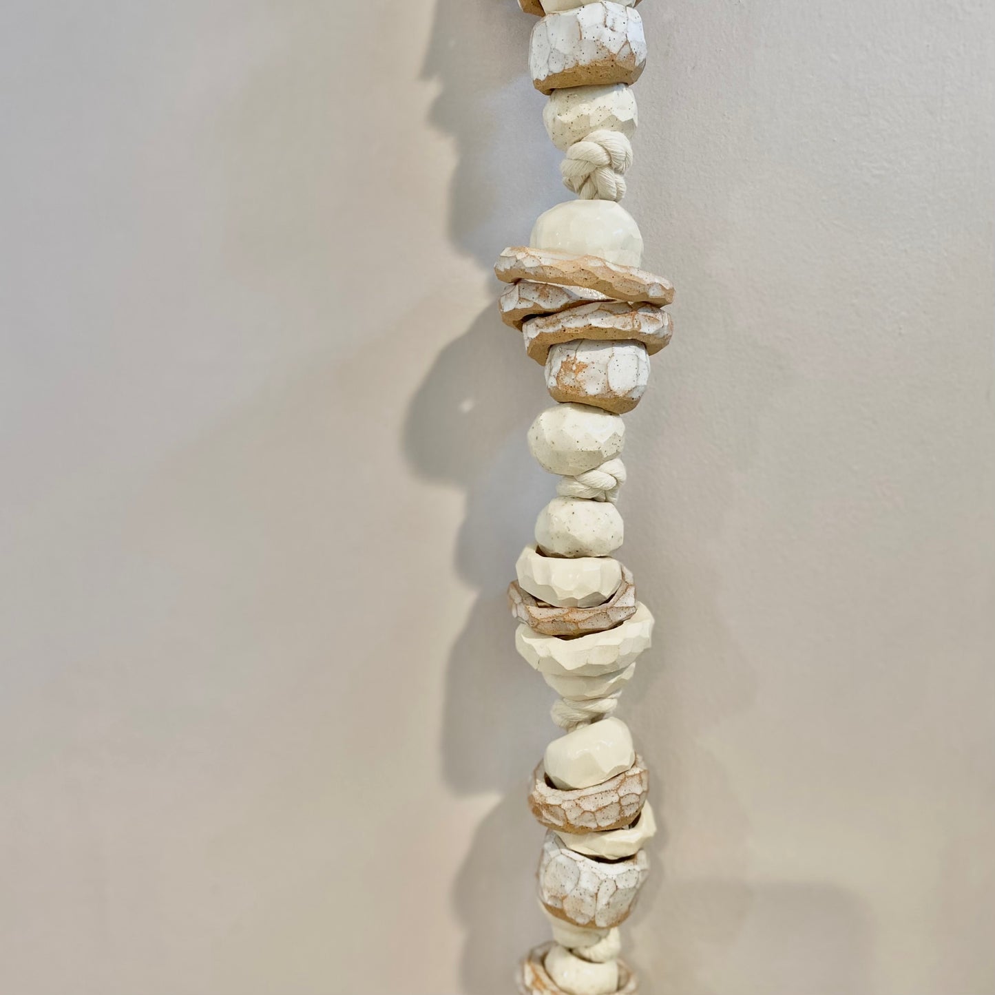 white strung ceramic beads