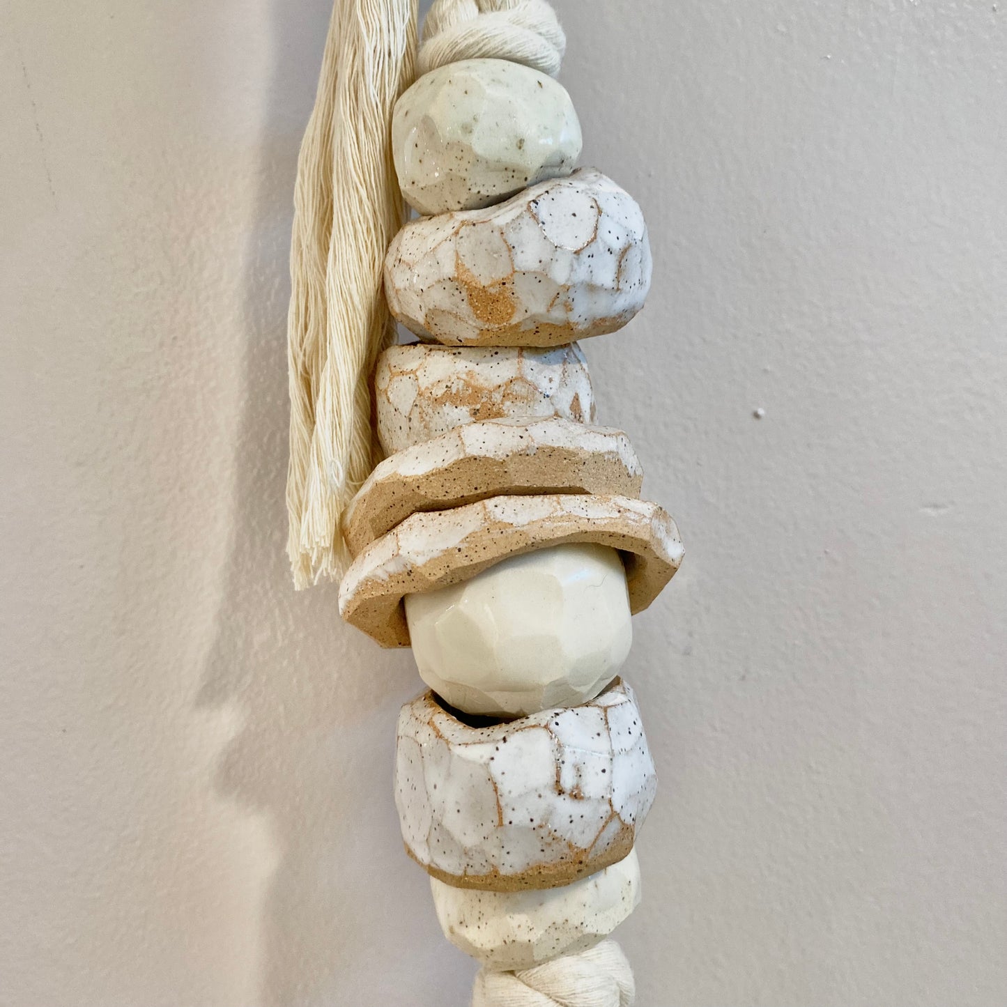 white strung ceramic beads