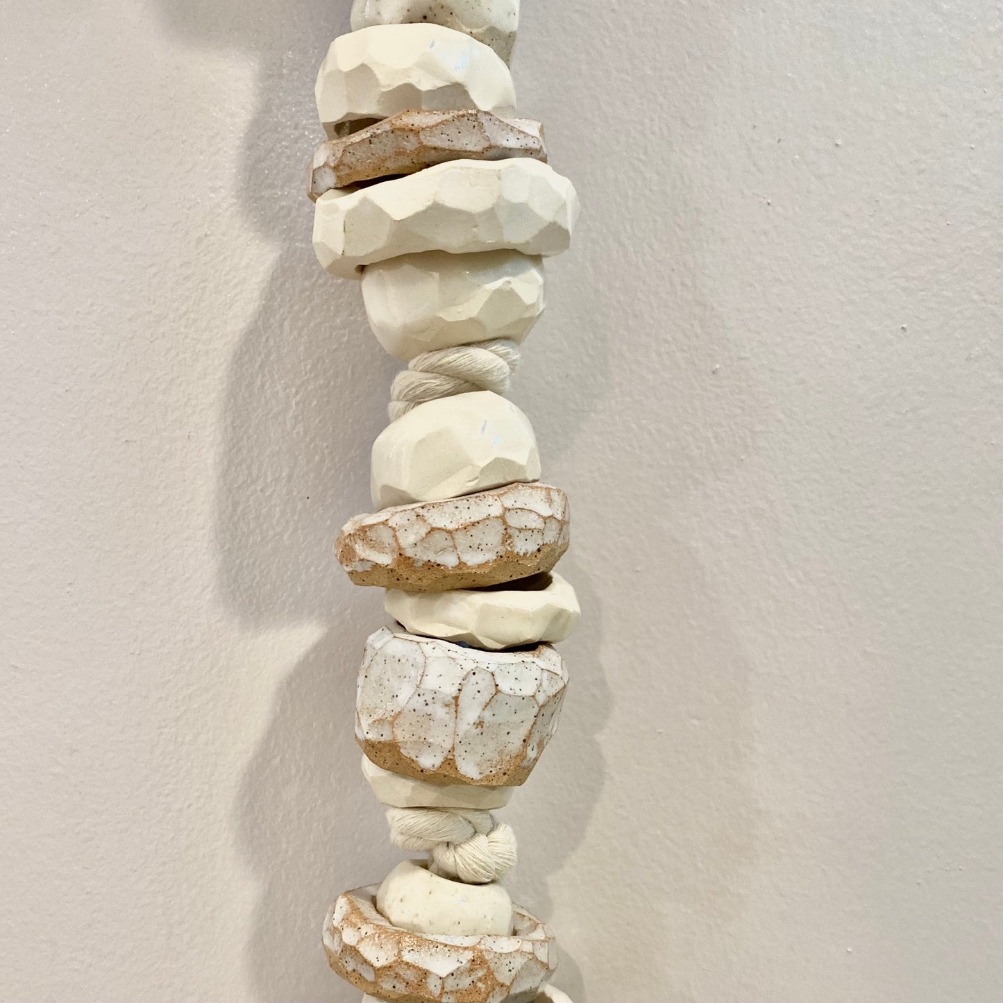 white strung ceramic beads