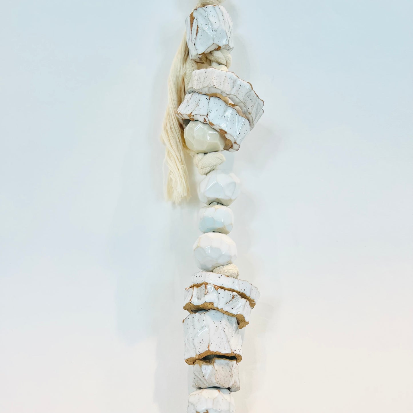 white strung ceramic beads
