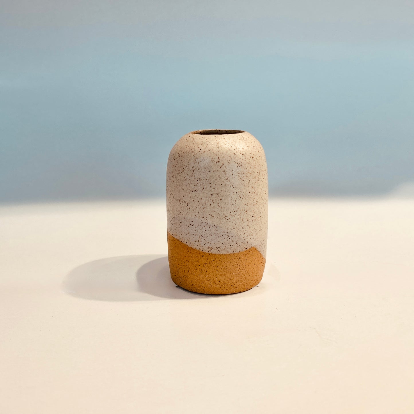 rounded walnut vase